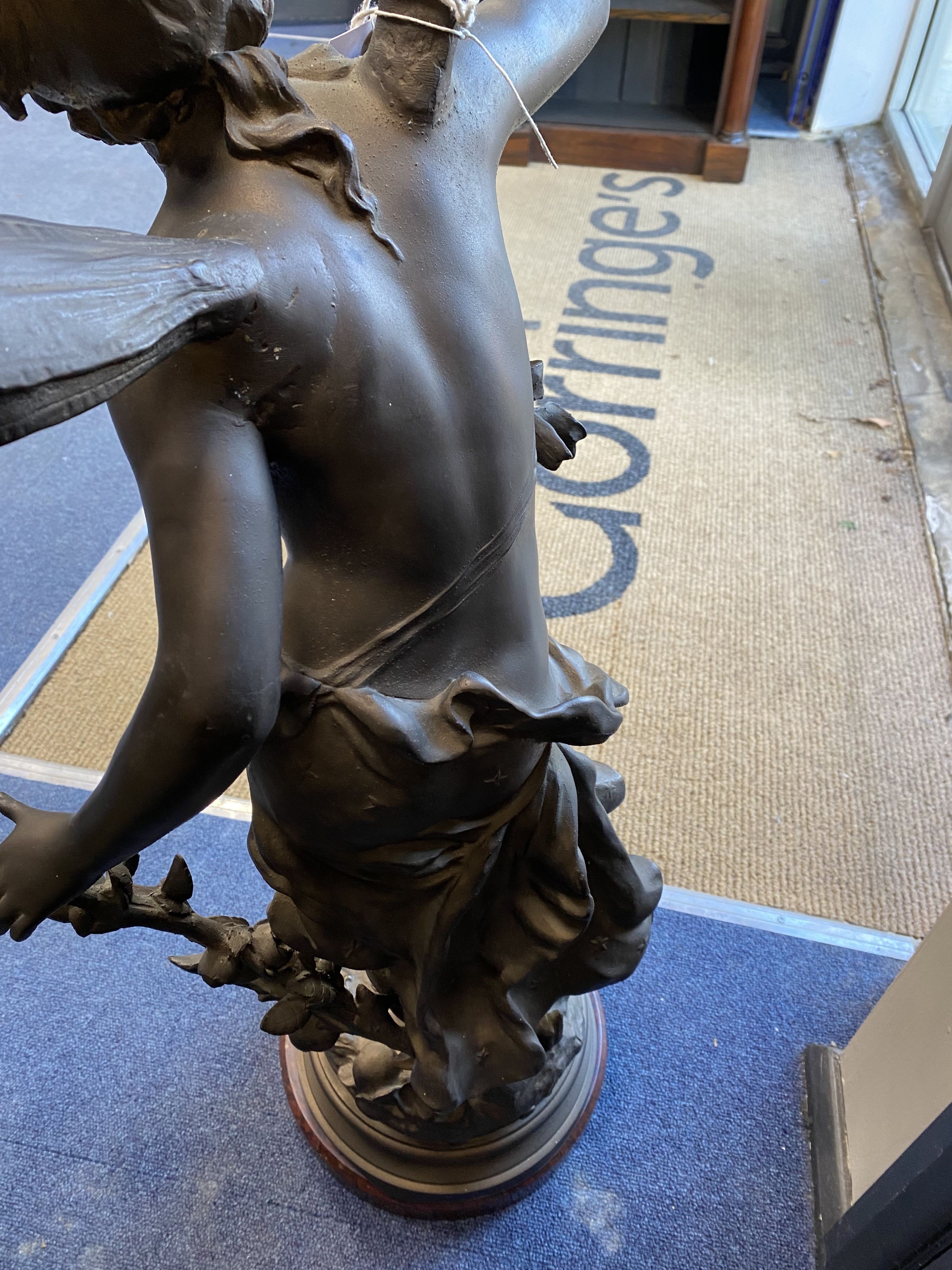 A 'Fee Aux Fleurs' cast bronze spelter fairy statue on marble base, height 90cm